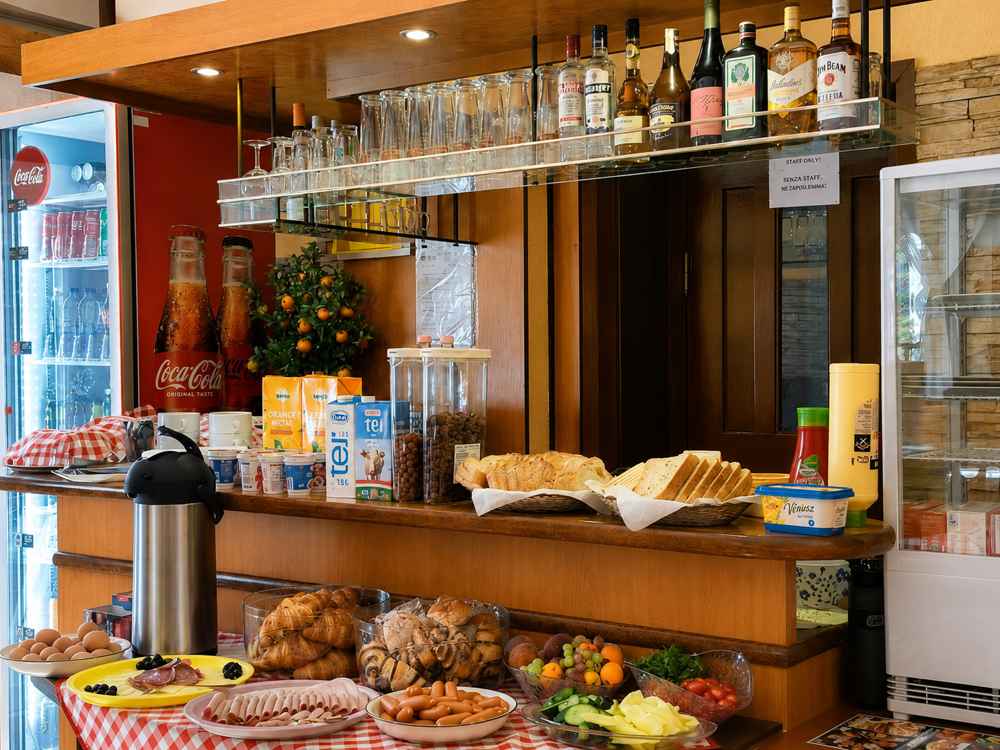 Continental buffet breakfast laid out on a table at the villa